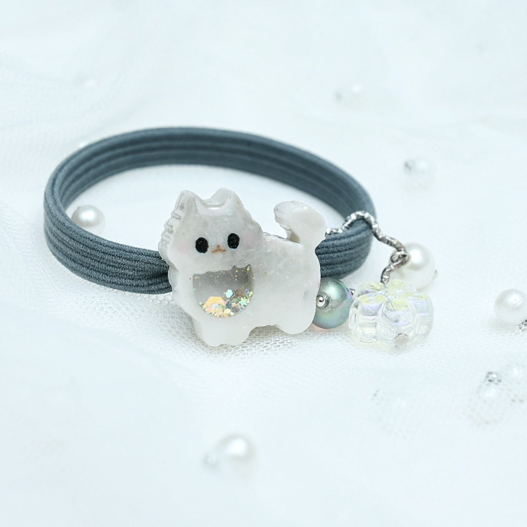 Tiny Pommie Hairtie