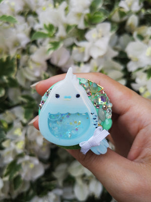 Baby Budgie on Mint Grip
