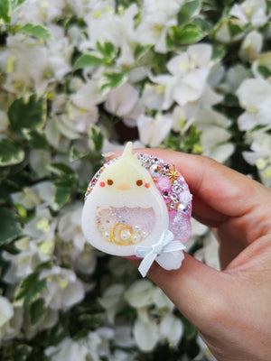 Baby Cockatiel with shaker egg on Pink Grip