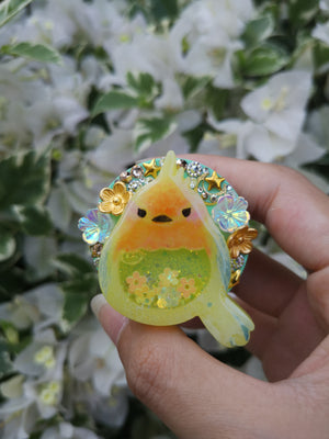 Baby Prothonotory Warbler on Mint Grip