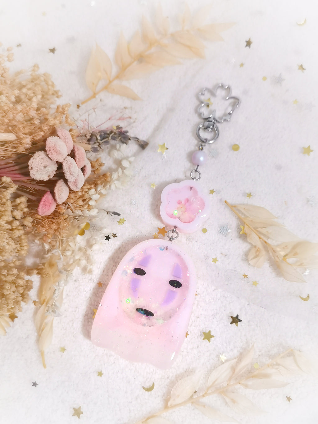 Pink Fading Kaonashi with glowing eyes Charm