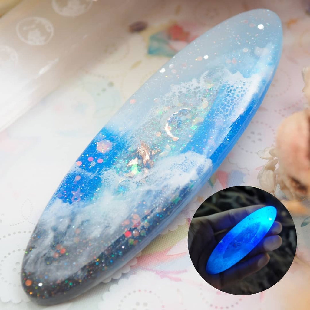 Twilight Tides Shaker Barette (shark pool,oval)