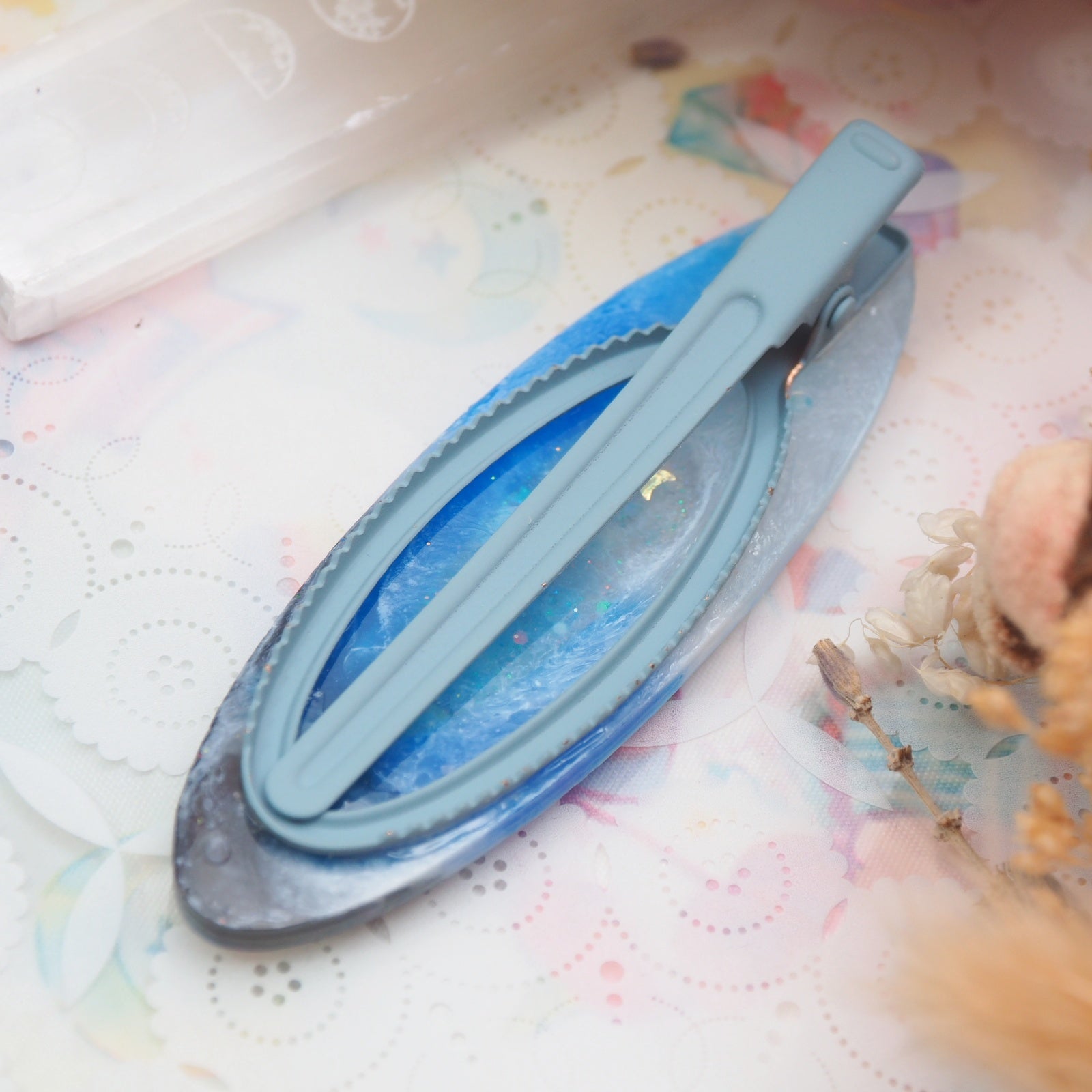 Twilight Tides Shaker Barette (shark pool,oval)