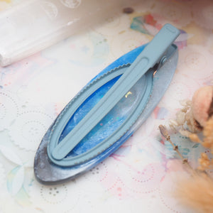 Twilight Tides Shaker Barette (shark pool,oval)