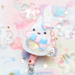Winter Hat Bun Badge Reel (Pastel blue and pink)