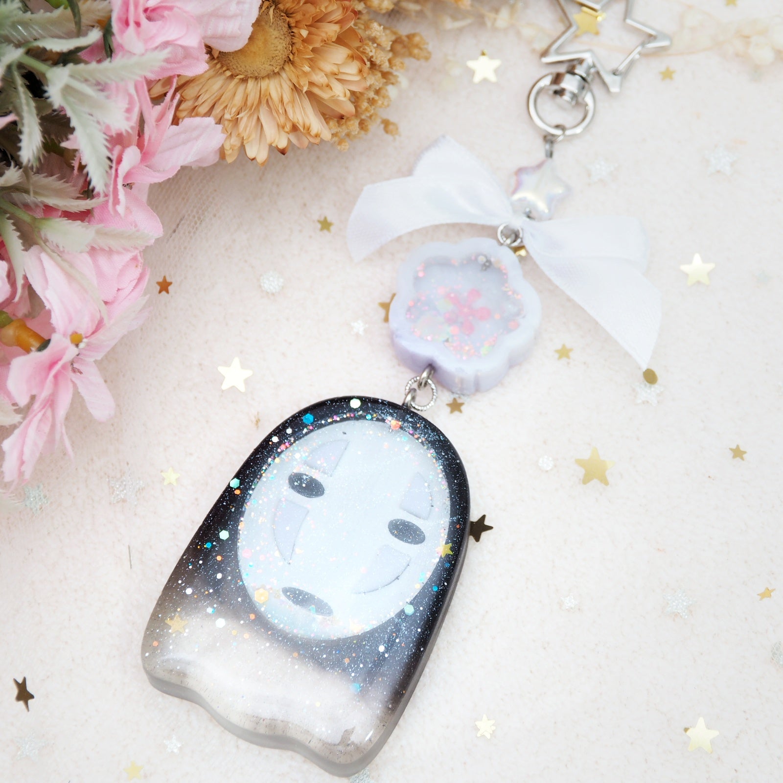 Fading Kaonashi with glowing eyes Charm