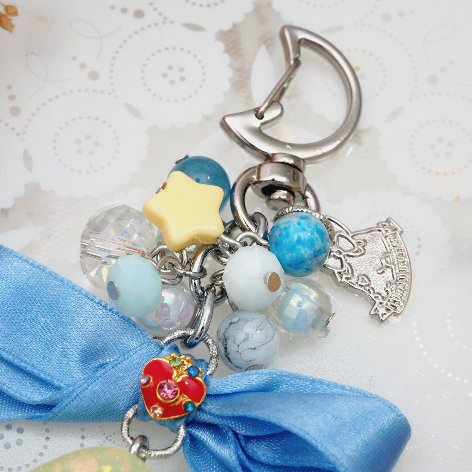 Spinning Orgel Charm (Sky Blue Ribbon)