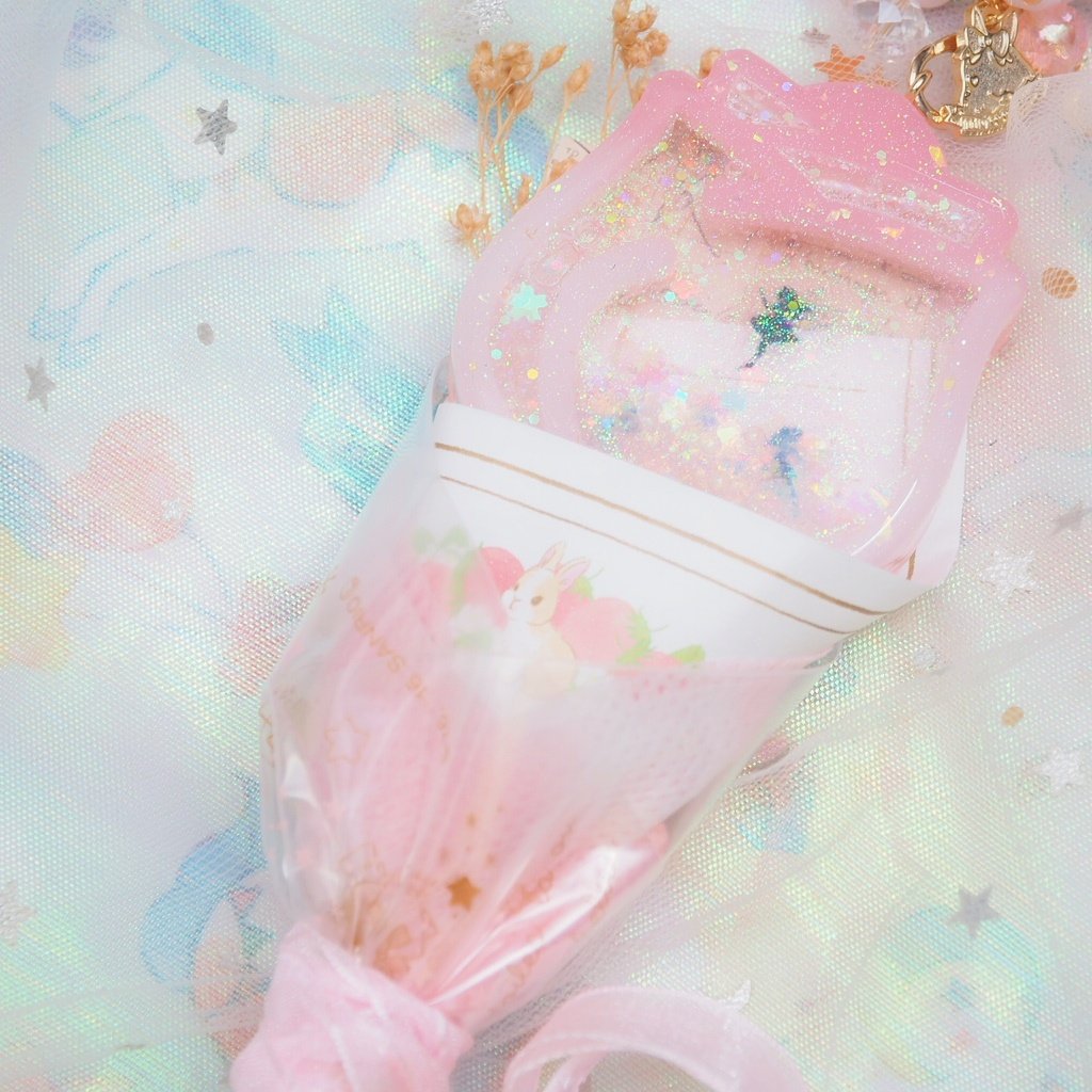 Tinted Pink Secret World Bouquet with detachable Charm