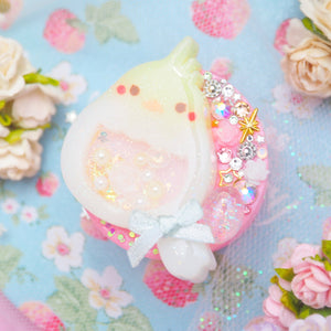 Baby Cockatiel with shaker egg on Pink Grip
