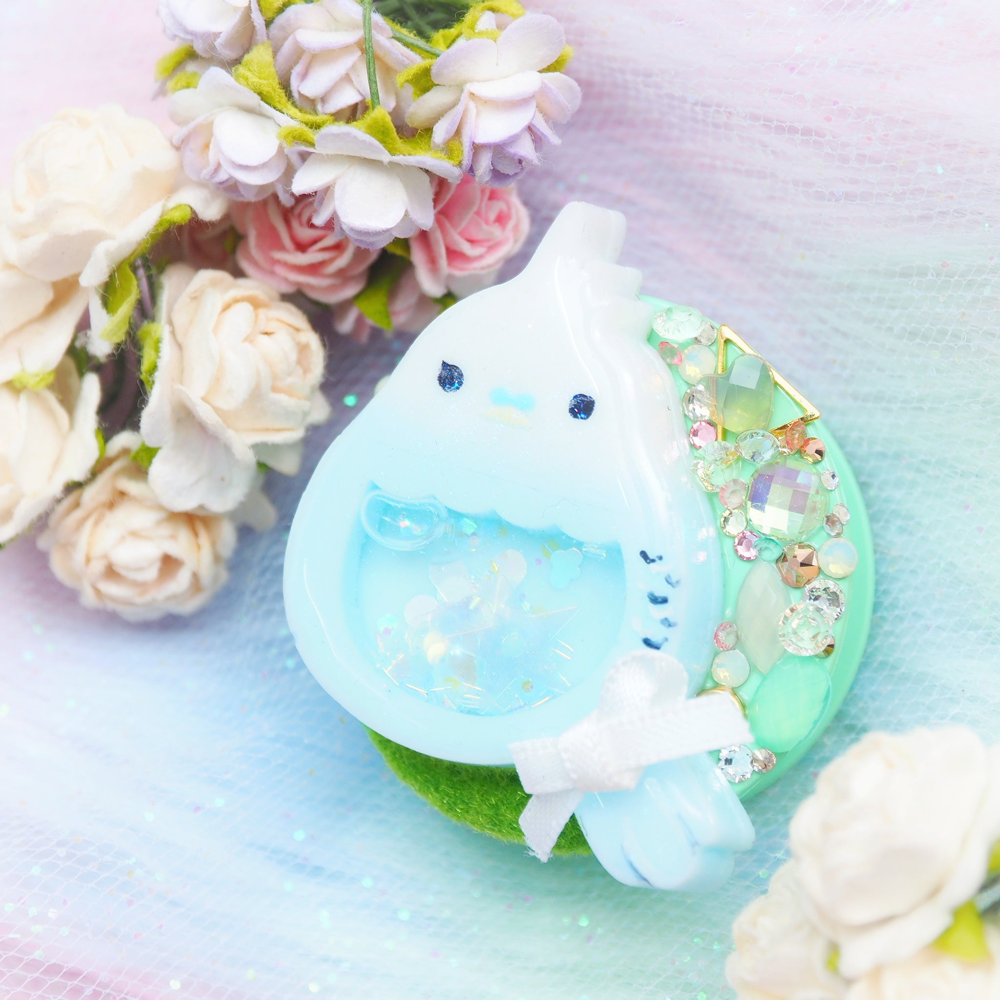 Baby Budgie on Mint Grip
