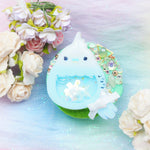 Baby Budgie on Mint Grip
