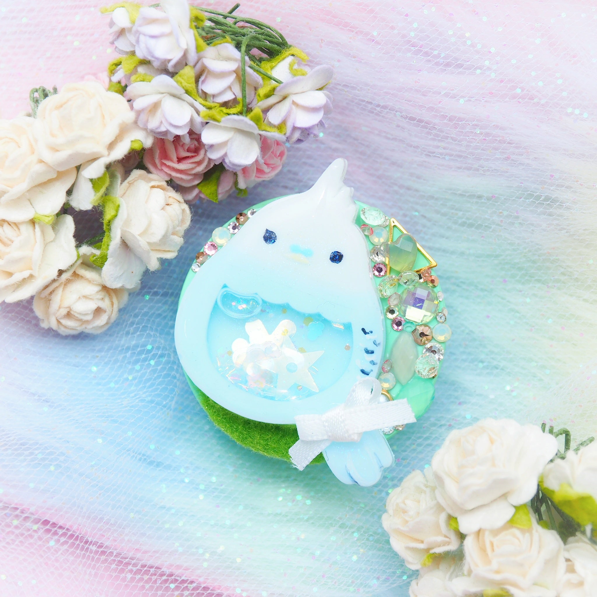 Baby Budgie on Mint Grip