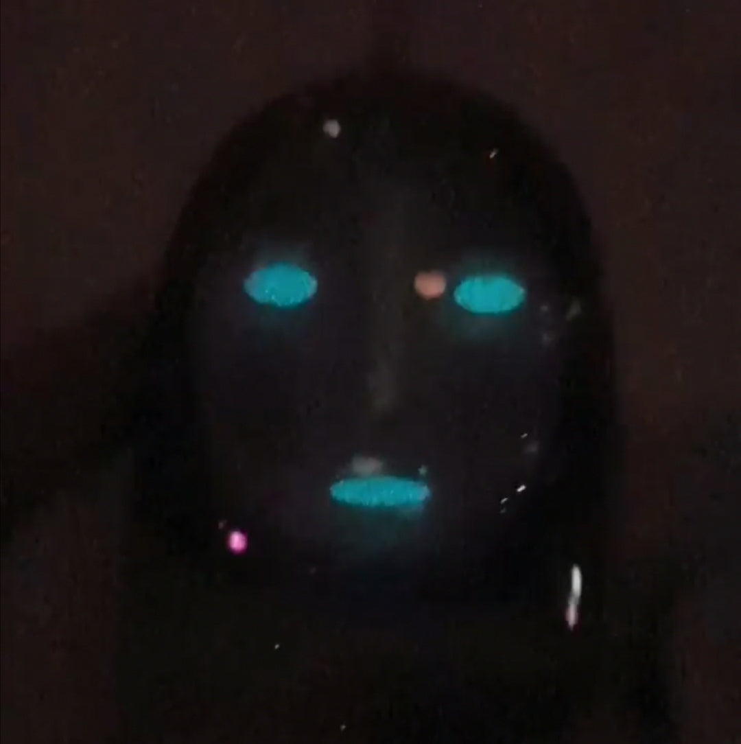 Fading Kaonashi with glowing eyes Charm