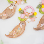 Little Otter Lifesaver Charm (caramel with pink conch)