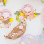 Little Otter Lifesaver Charm (classic with pink seashell)
