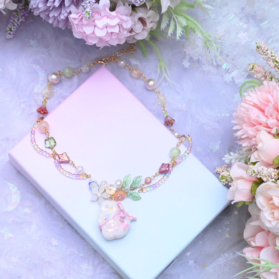 Pink Kagami Mochi Bunny Beaded Necklace with wire-wrapped floral motif