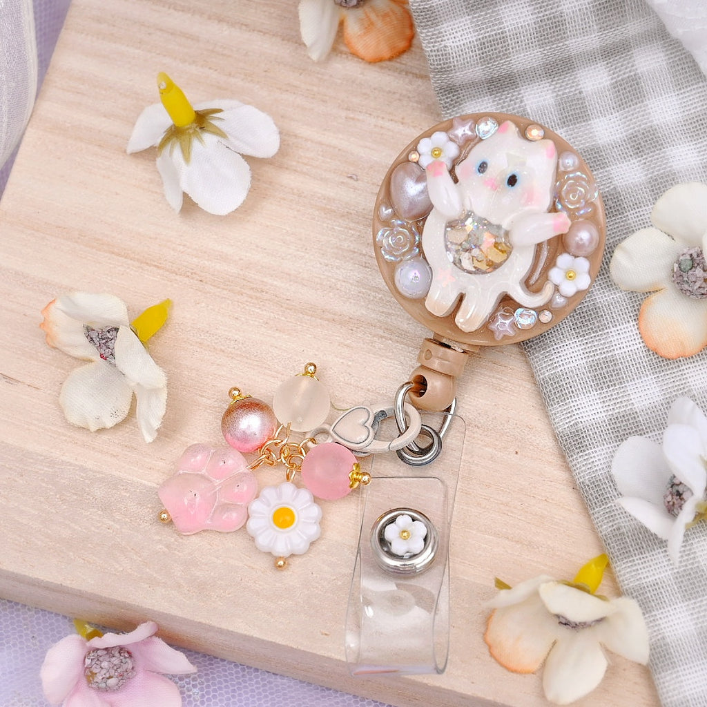 Badge Reel  - Surprise! Cream Point