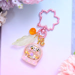 Tiny Pink Daruma charm