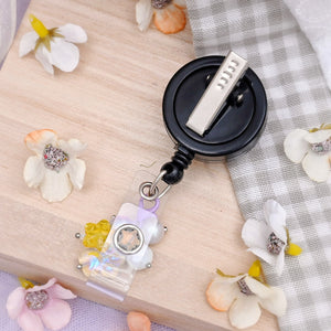 Badge Reel  - Brown cat sending hugs